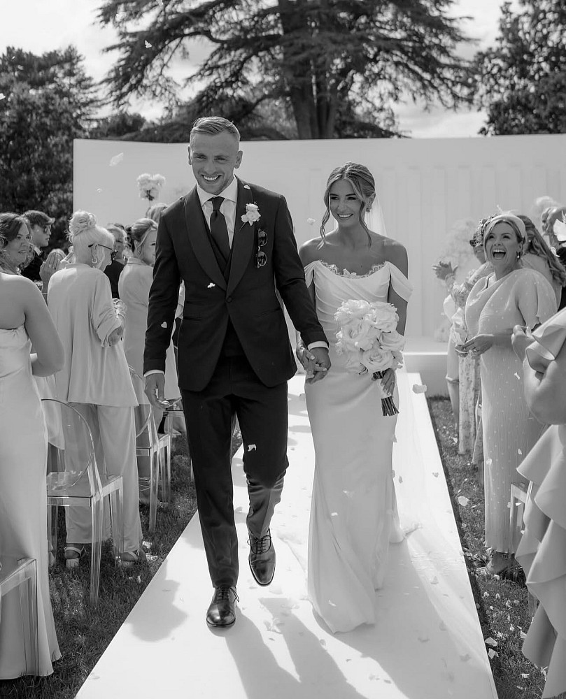 Dani Dyer marries Jarrod Bowen wearing bespoke Suzanne Neville