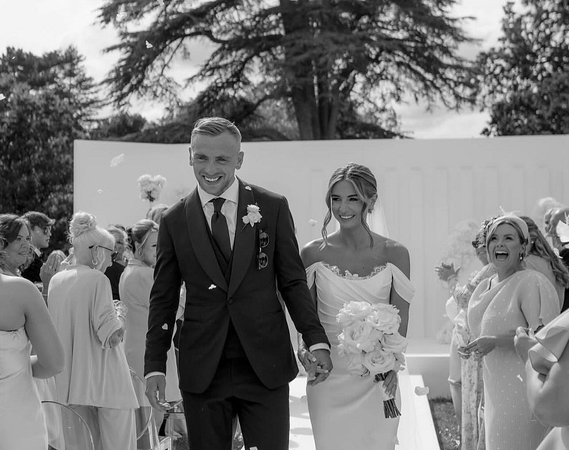 Dani Dyer marries Jarrod Bowen wearing bespoke Suzanne Neville