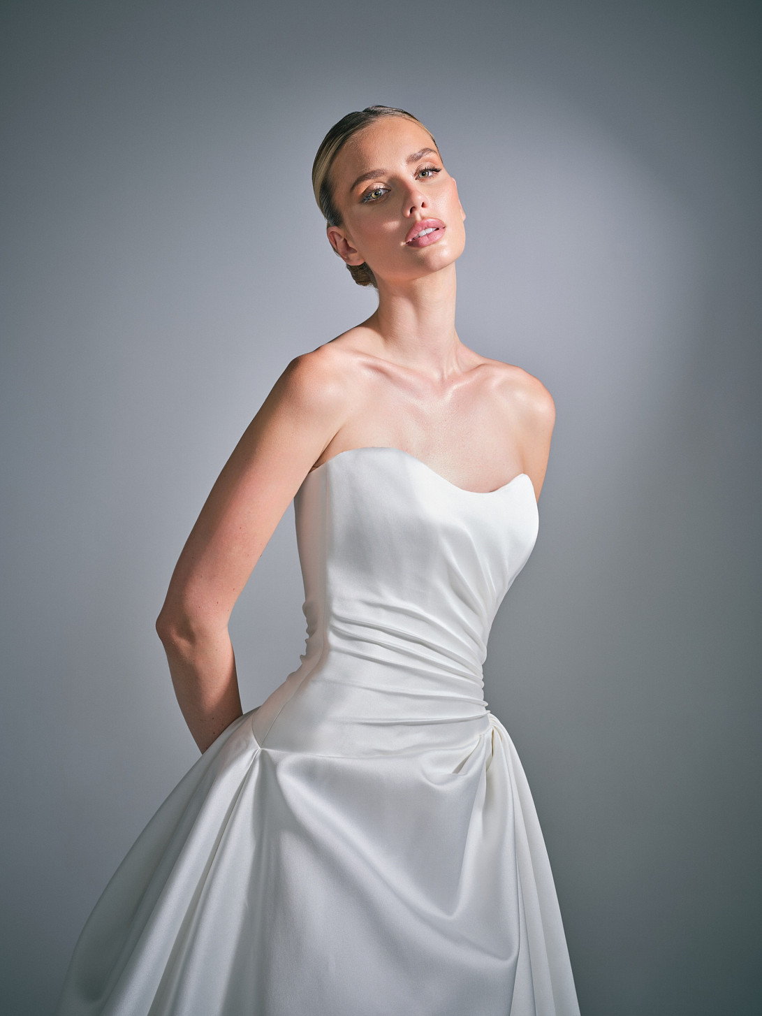 Front view of the Cassielle Mikado ballgown wedding dress by Suzanne Neville, showing a sculpted feminine silhouette.